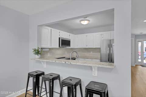 Tiny photo for 6211 Wrightsville Avenue #Apt 129, Wilmington, NC 28403 (MLS # 100594016)