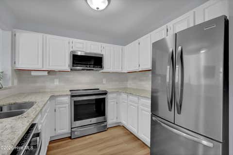 Tiny photo for 6211 Wrightsville Avenue #Apt 129, Wilmington, NC 28403 (MLS # 100594016)