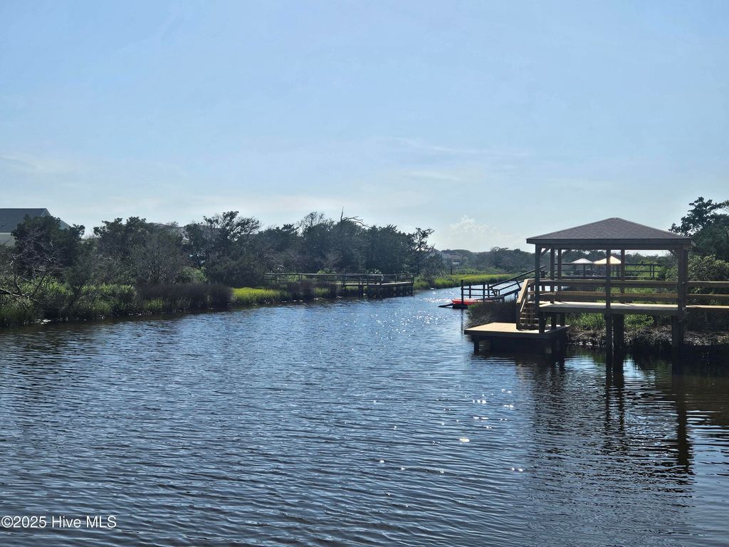 Photo of 107 SE 37th Street, Oak Island, NC 28465 (MLS # 100520602)