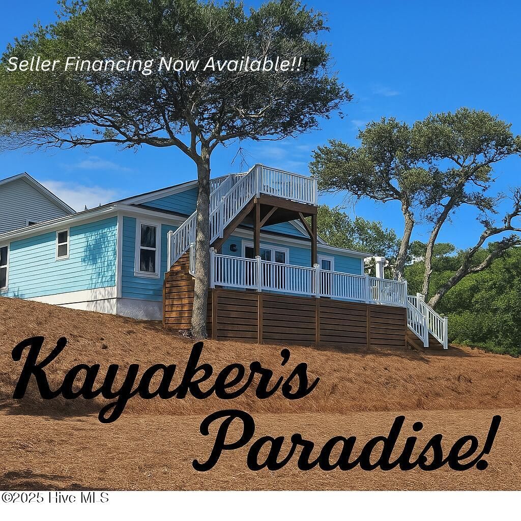 Photo of 107 SE 37th Street, Oak Island, NC 28465 (MLS # 100520602)