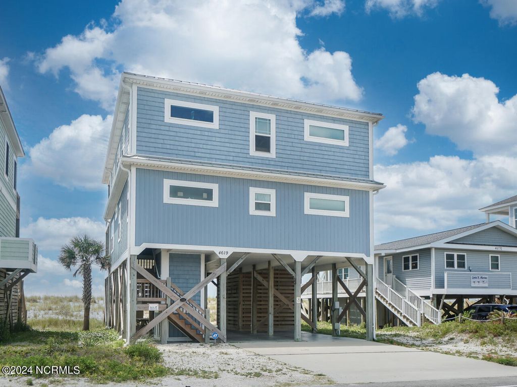 Photo of 4619 E Beach Drive, Oak Island, NC 28465 (MLS # 100560246)
