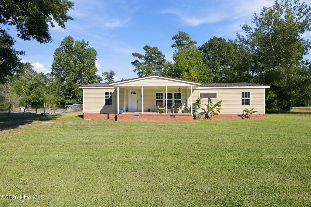Photo of 221 Oakwood Drive, New Bern, NC 28560 (MLS # 100609494)
