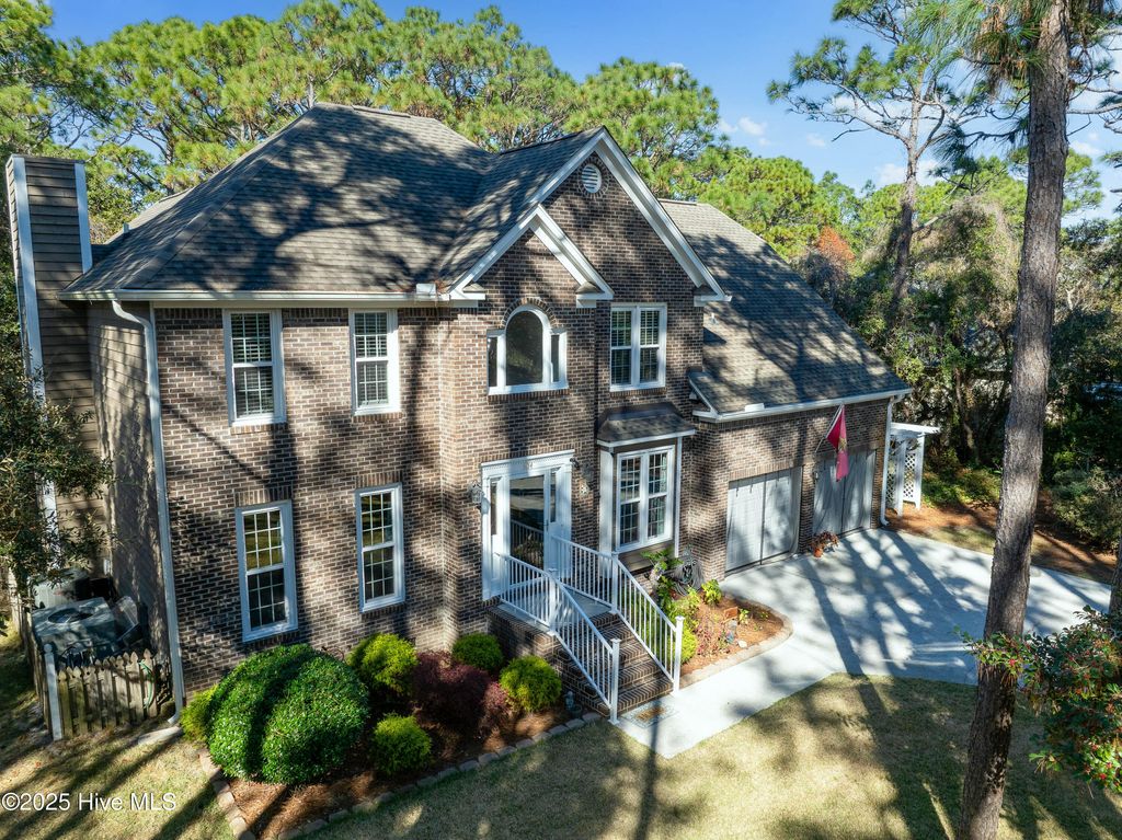 Photo of 504 Periwinkle Way, Oak Island, NC 28465 (MLS # 100542909)