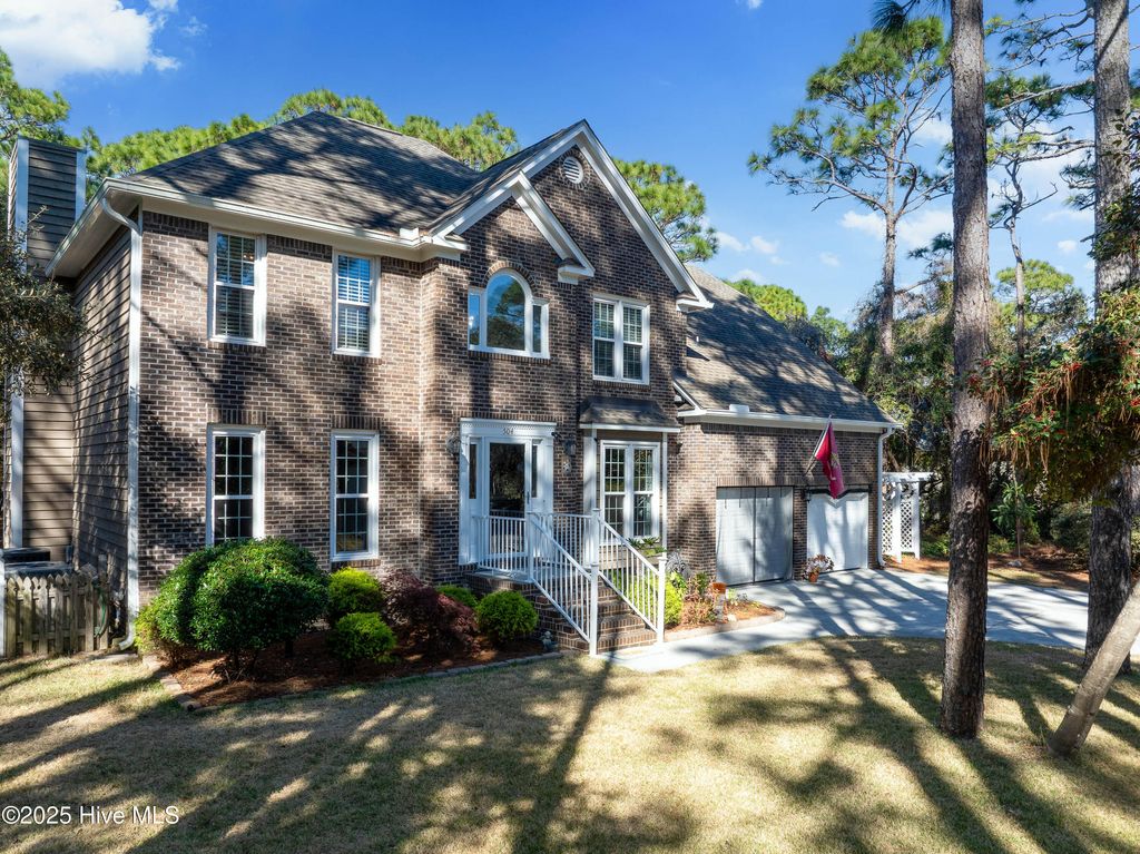 Photo of 504 Periwinkle Way, Oak Island, NC 28465 (MLS # 100542909)
