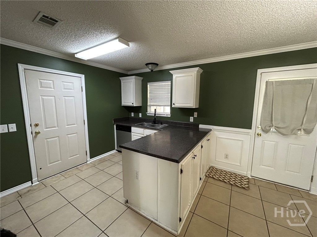 Photo of 121 Calico Ct Ct, Midway, GA 31320 (MLS # SA351892)