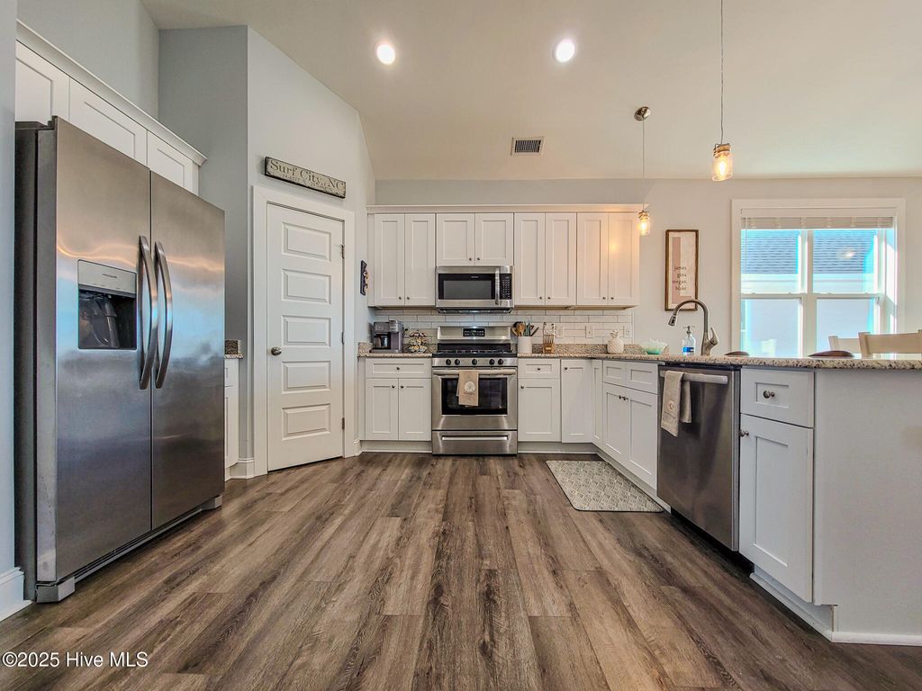 Photo of 127 S Boca Bay Lane #A, Surf City, NC 28445 (MLS # 100540688)