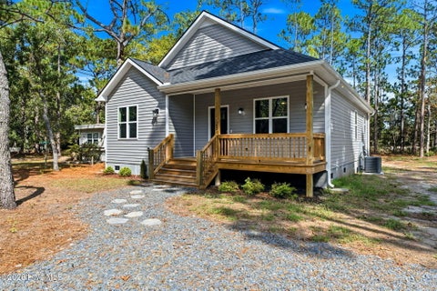 Photo of 142 Redwood Road, Boiling Spring Lakes, NC 28461 (MLS # 100575814)