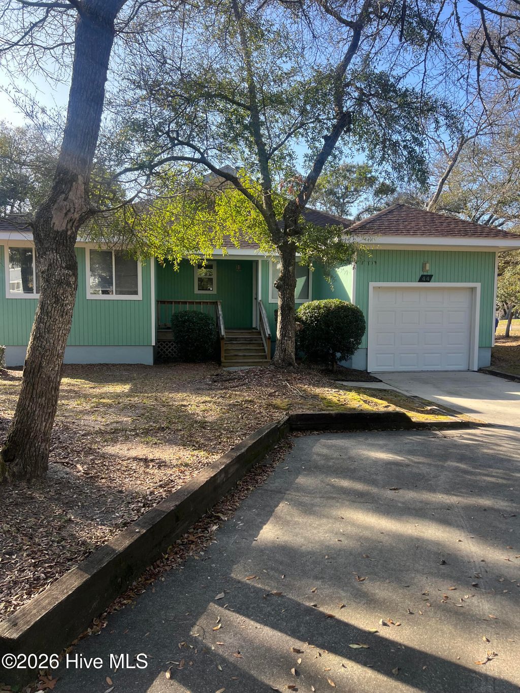 Photo of 44 Pinehurst Drive, Oak Island, NC 28465 (MLS # 100563944)