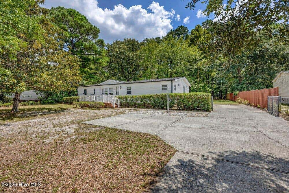Photo of 9279 Timber Lane NE, Leland, NC 28451 (MLS # 100594036)