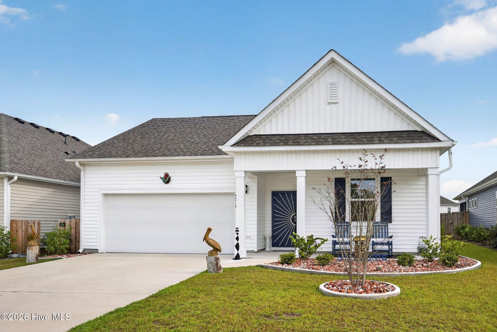 Photo of 6936 Sasparilla Drive, Leland, NC 28451 (MLS # 100609774)