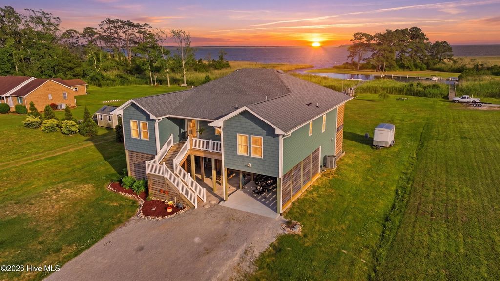 Photo of 105 Knotts Landing Lane, Knotts Island, NC 27950 (MLS # 100574287)
