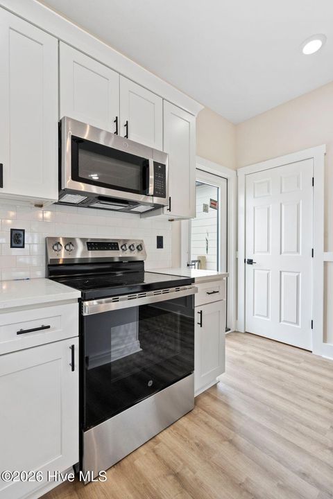 Tiny photo for 209 Shell Road #3b, Surf City, NC 28445 (MLS # 100558043)