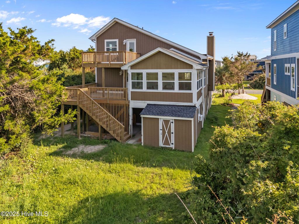 Photo of 312 E Dolphin Drive, Oak Island, NC 28465 (MLS # 100526723)