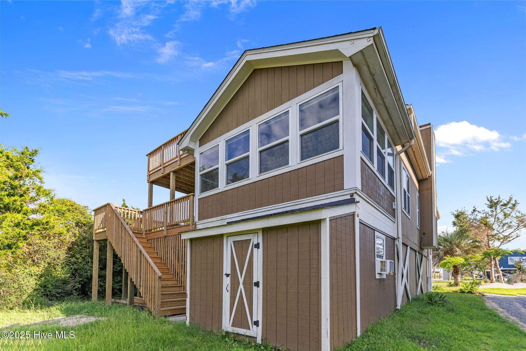 Photo of 312 E Dolphin Drive, Oak Island, NC 28465 (MLS # 100526723)