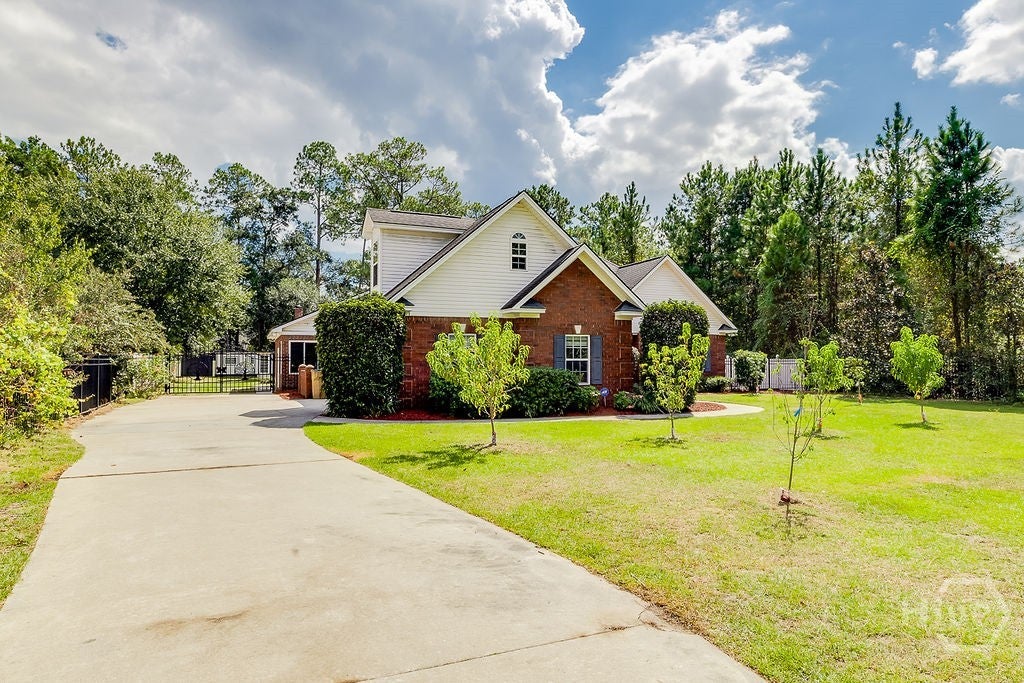 Photo of 215 Zittrouer Road, Guyton, GA 31312 (MLS # SA365750)