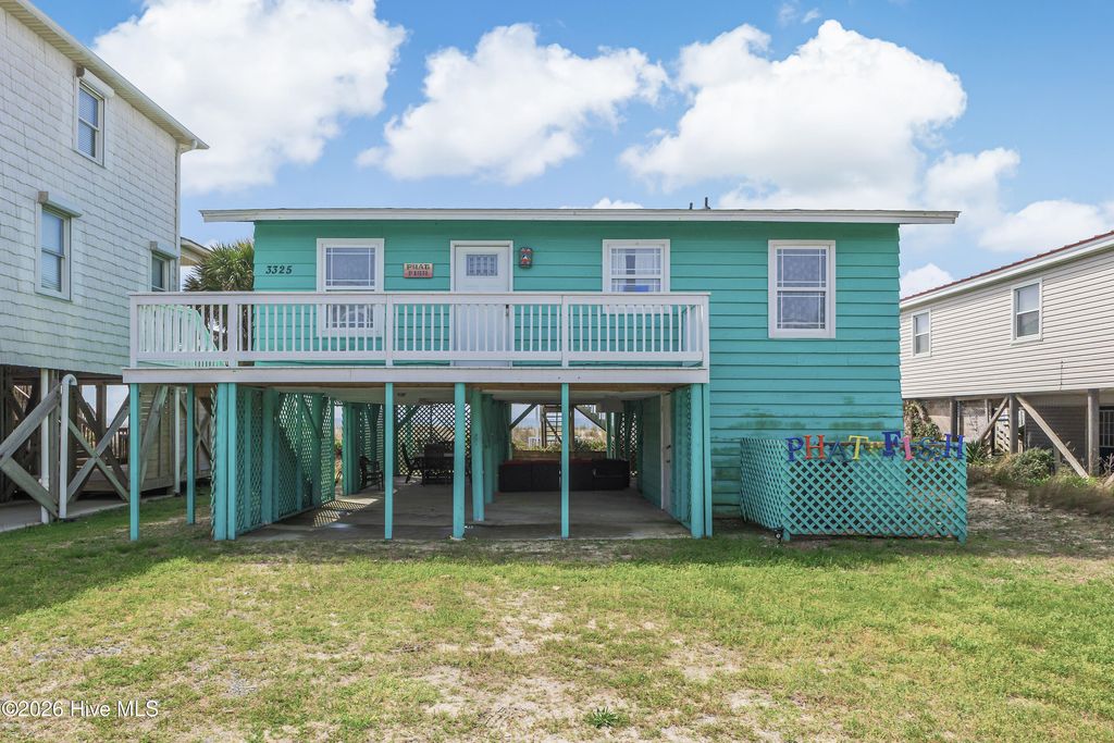Photo of 3325 W Beach Drive, Oak Island, NC 28465 (MLS # 100553168)