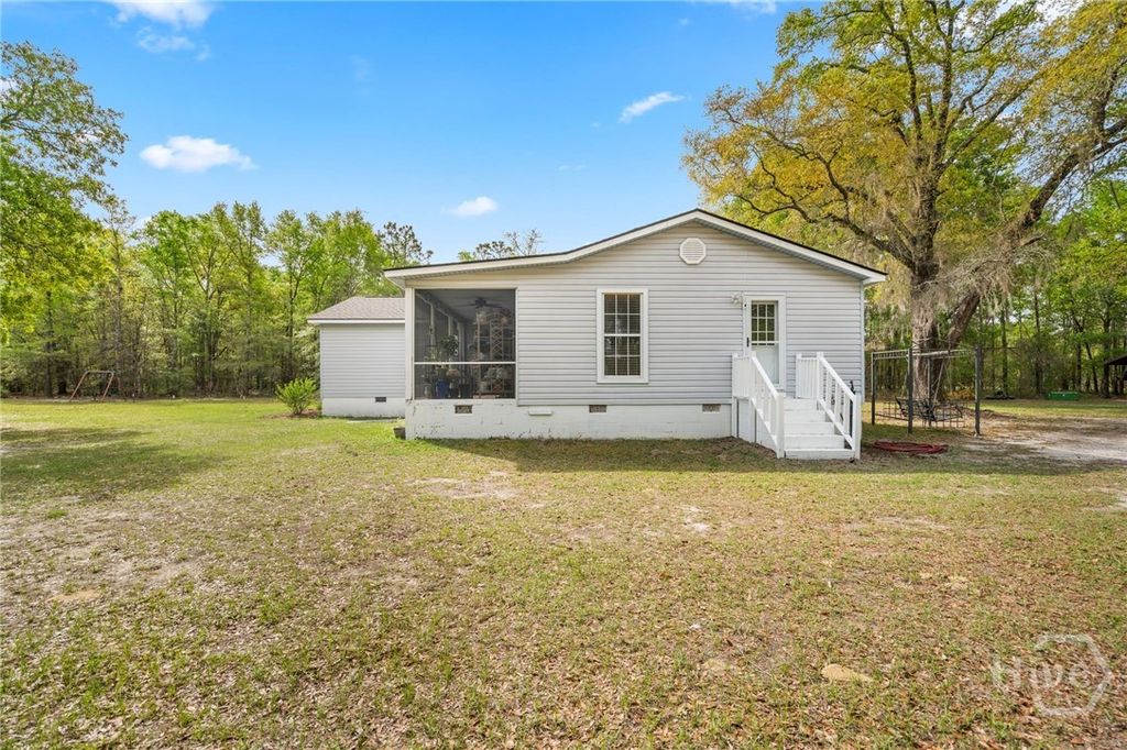 Photo of 325 Groveland Nevils Road, Pembroke, GA 31321 (MLS # SA353018)