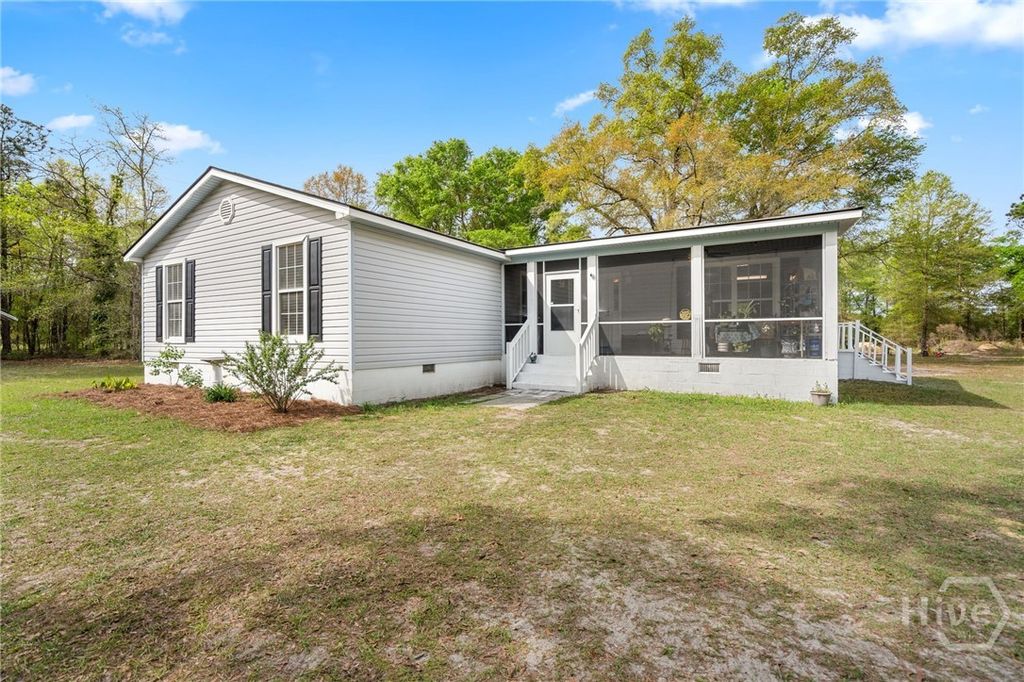 Photo of 325 Groveland Nevils Road, Pembroke, GA 31321 (MLS # SA353018)