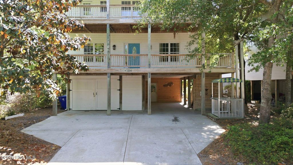 Photo of 104 SW 28th Street, Oak Island, NC 28465 (MLS # 100568411)