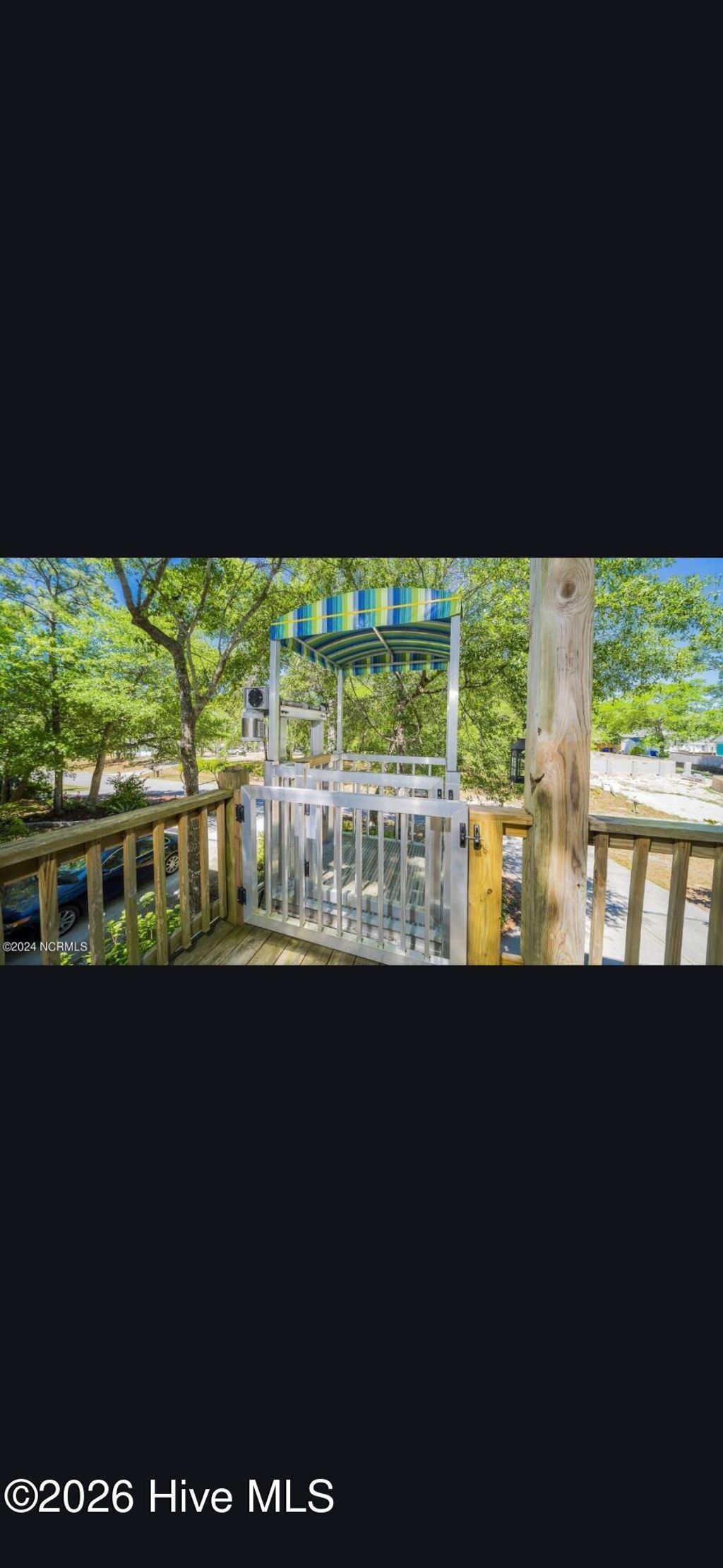 Photo of 104 SW 28th Street, Oak Island, NC 28465 (MLS # 100568411)