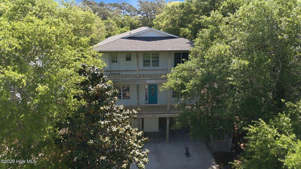 Photo of 104 SW 28th Street, Oak Island, NC 28465 (MLS # 100568411)