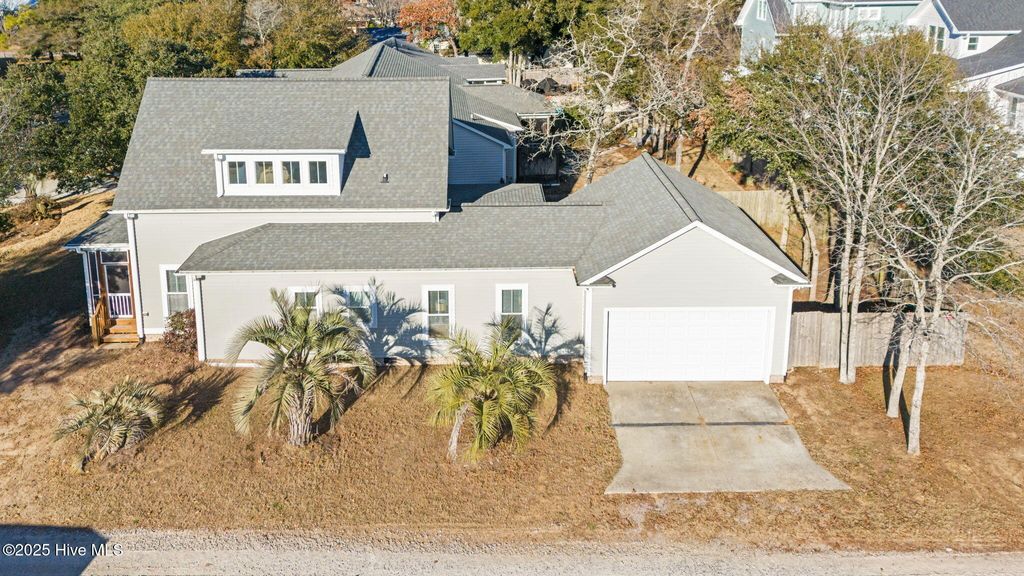 Photo of 102 NE 63rd Street, Oak Island, NC 28465 (MLS # 100546116)