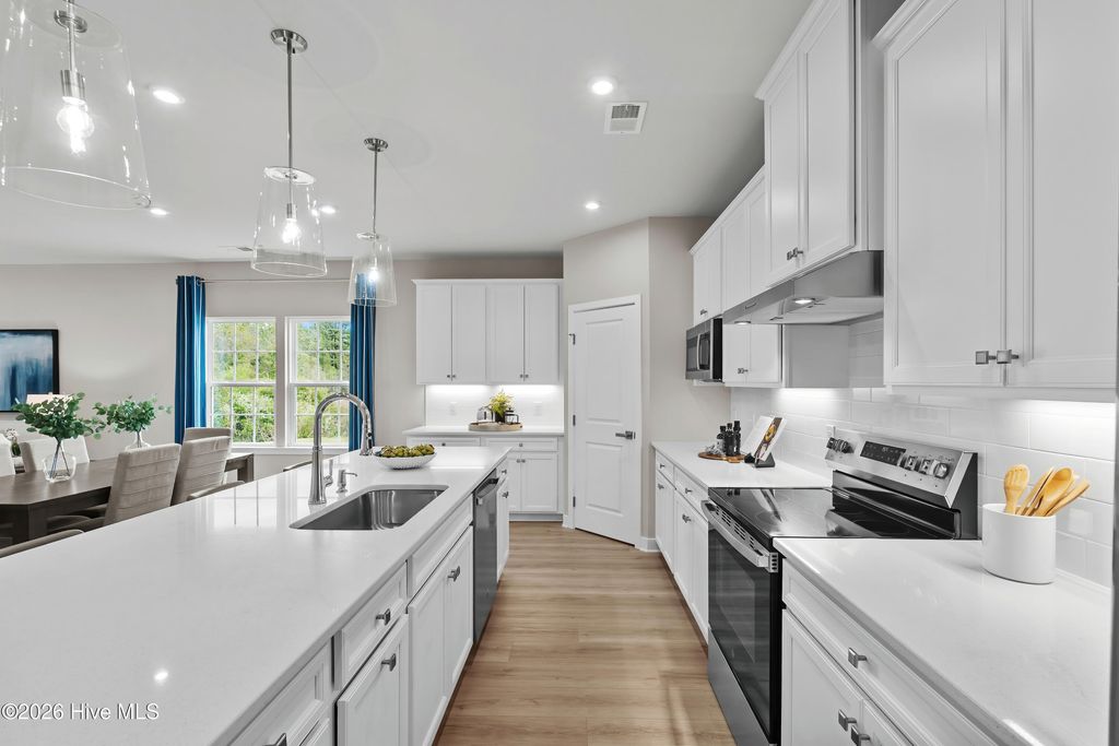 Photo of 638 Eastwood Park Road, Sunset Beach, NC 28468 (MLS # 100589126)