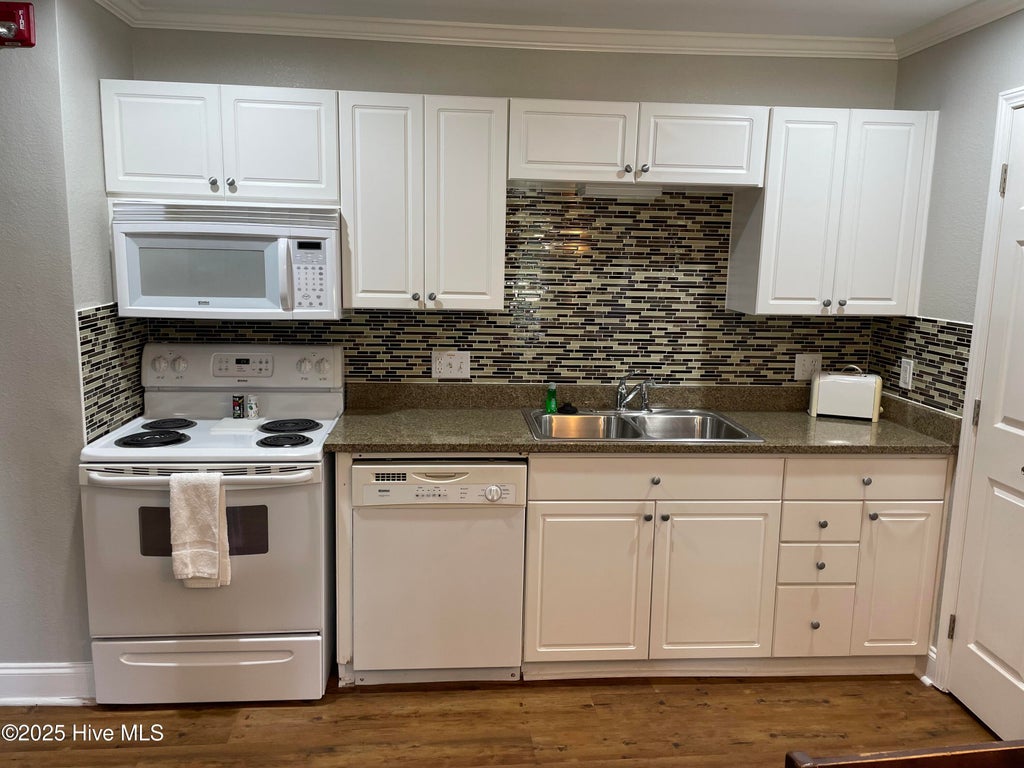 Photo of 520 Little River Farm Boulevard #C107, Carthage, NC 28327 (MLS # 100605980)