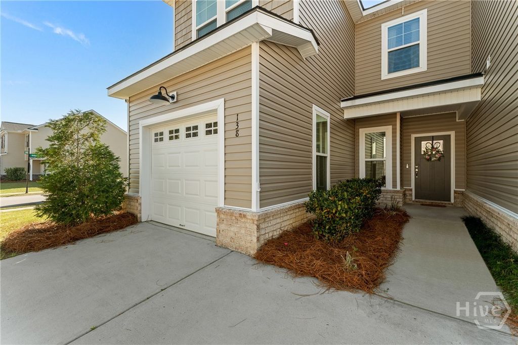 Photo of 138 Ainsdale Drive, Richmond Hill, GA 31324 (MLS # SA353446)