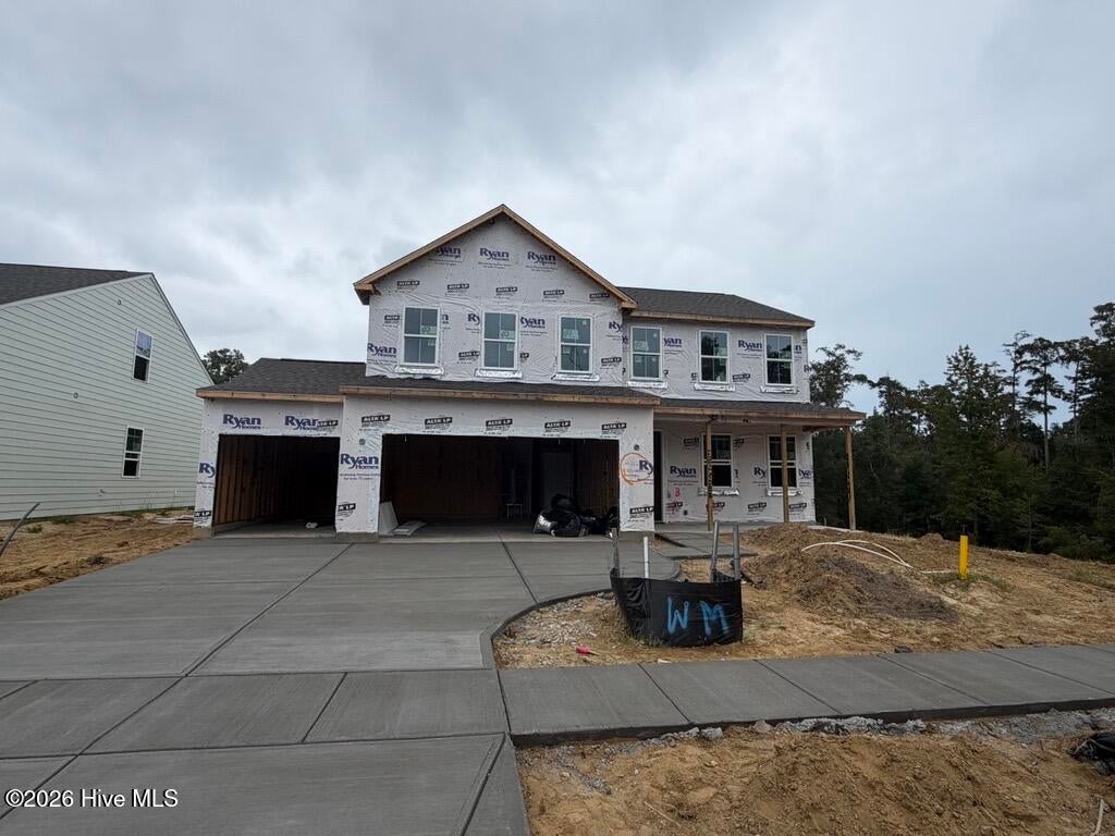 Photo of 4305 Farmfield Drive, Navassa, NC 28451 (MLS # 100606077)