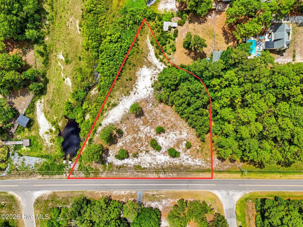 Photo of 1654 E Boiling Spring Lakes Road, Southport, NC 28461 (MLS # 100581299)