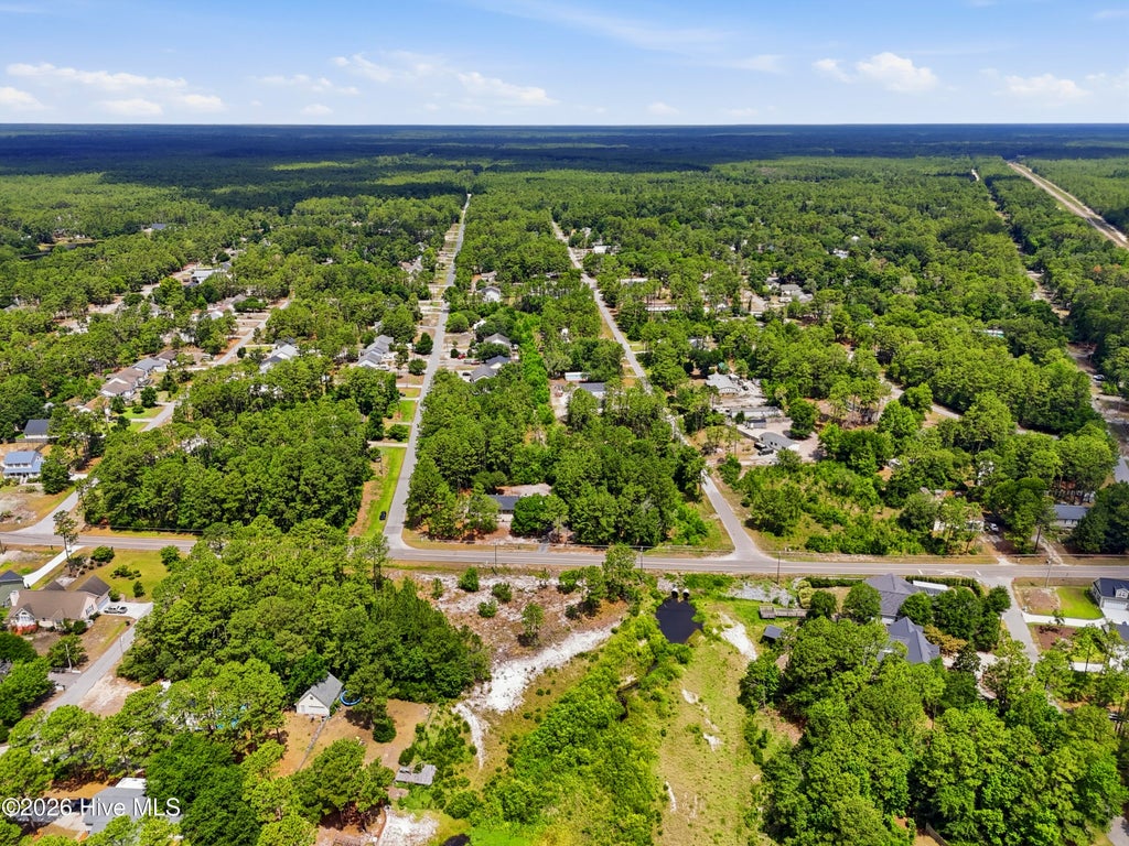 Photo of 1654 E Boiling Spring Lakes Road, Southport, NC 28461 (MLS # 100581299)
