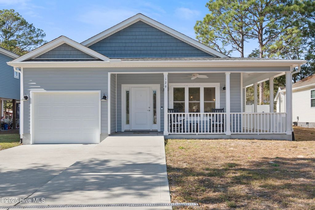 Photo of 129 NW 8th Street, Oak Island, NC 28465 (MLS # 100542658)