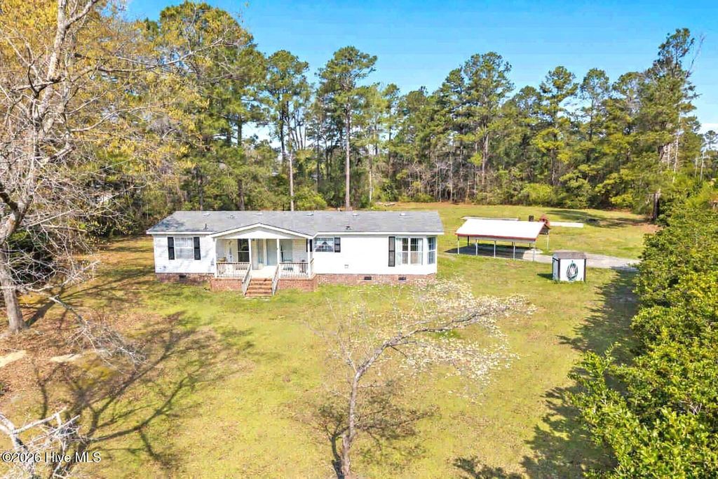 Photo of 5689 Maple Street NE, Winnabow, NC 28479 (MLS # 100562957)