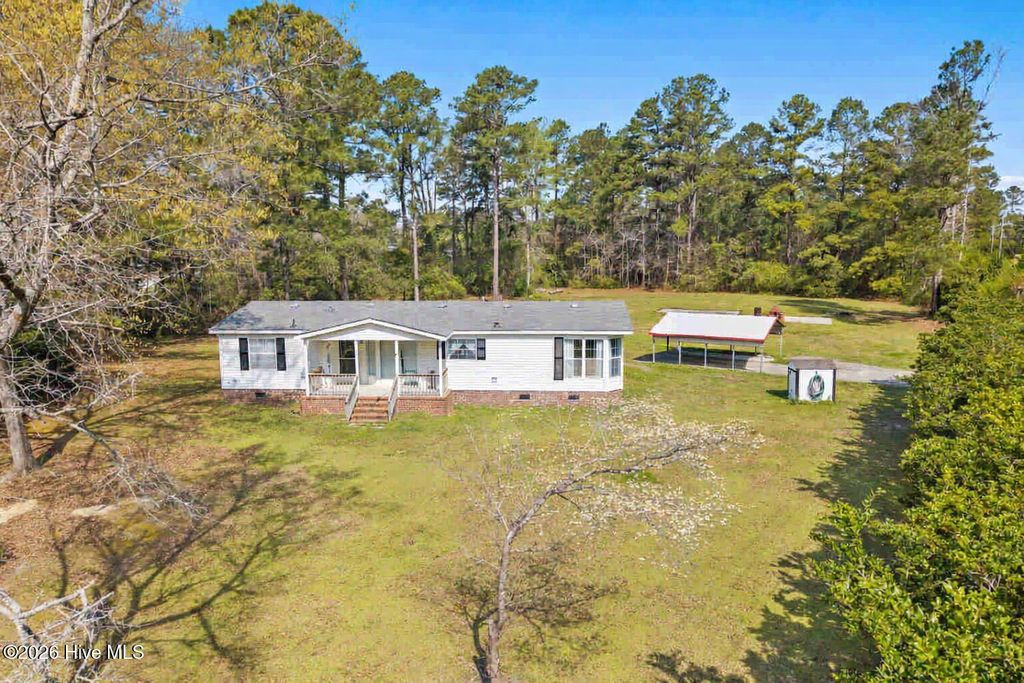 Photo of 5689 Maple Street NE, Winnabow, NC 28479 (MLS # 100562957)