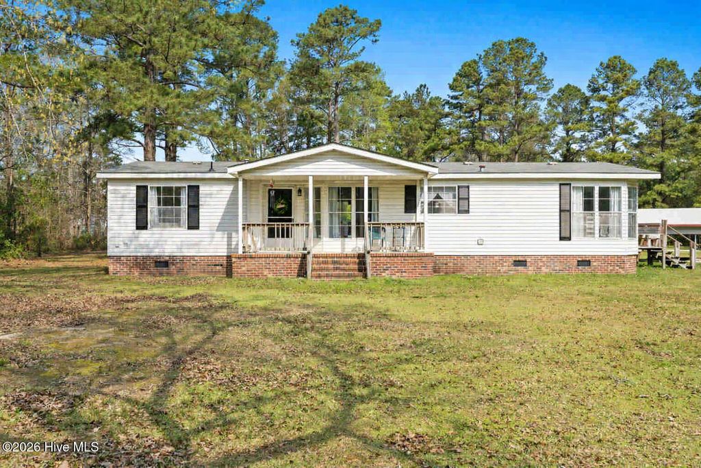 Photo of 5689 Maple Street NE, Winnabow, NC 28479 (MLS # 100562957)