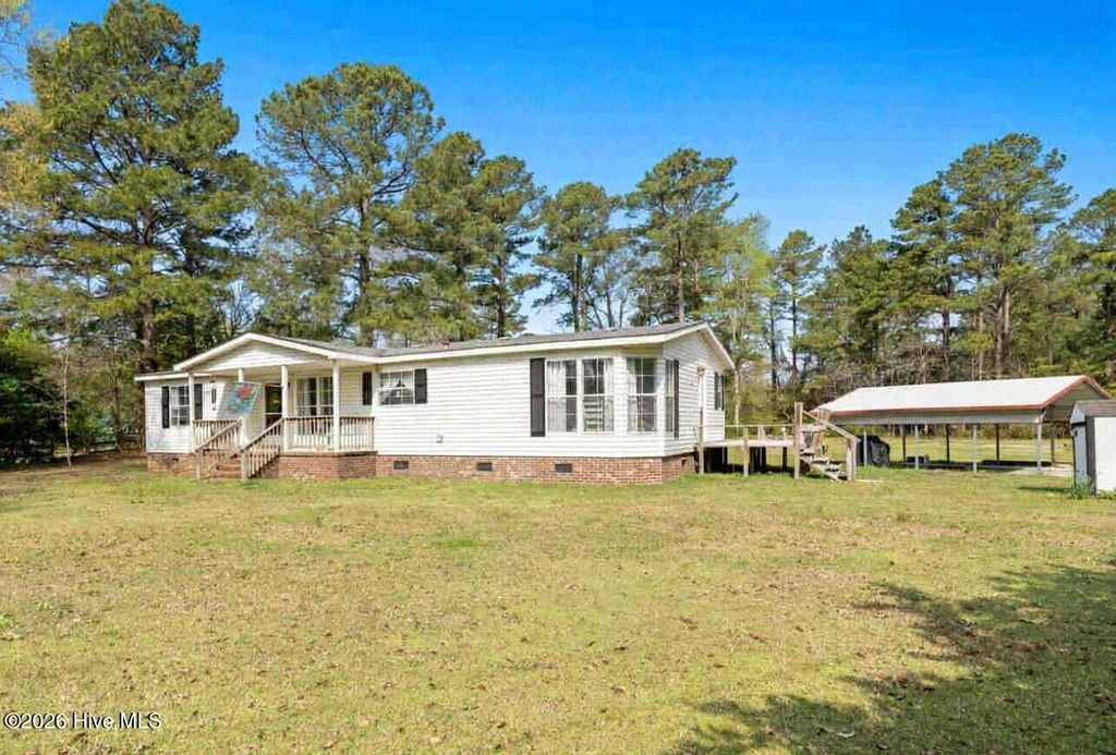 Photo of 5689 Maple Street NE, Winnabow, NC 28479 (MLS # 100562957)