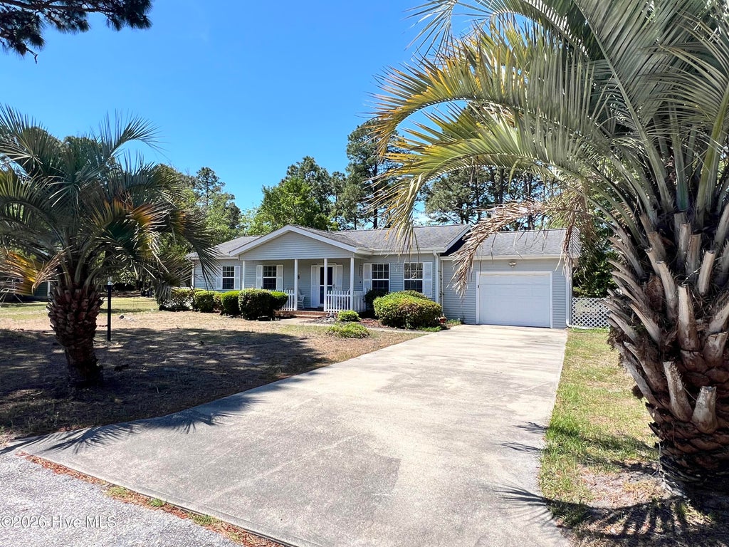 Photo of 1093 Harbor Drive SW, Calabash, NC 28467 (MLS # 100579027)
