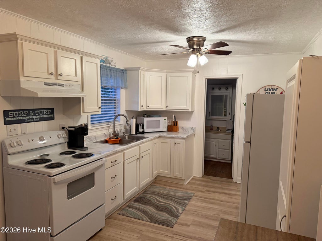 Photo of 208 Georgia Avenue, Carolina Beach, NC 28428 (MLS # 100607587)