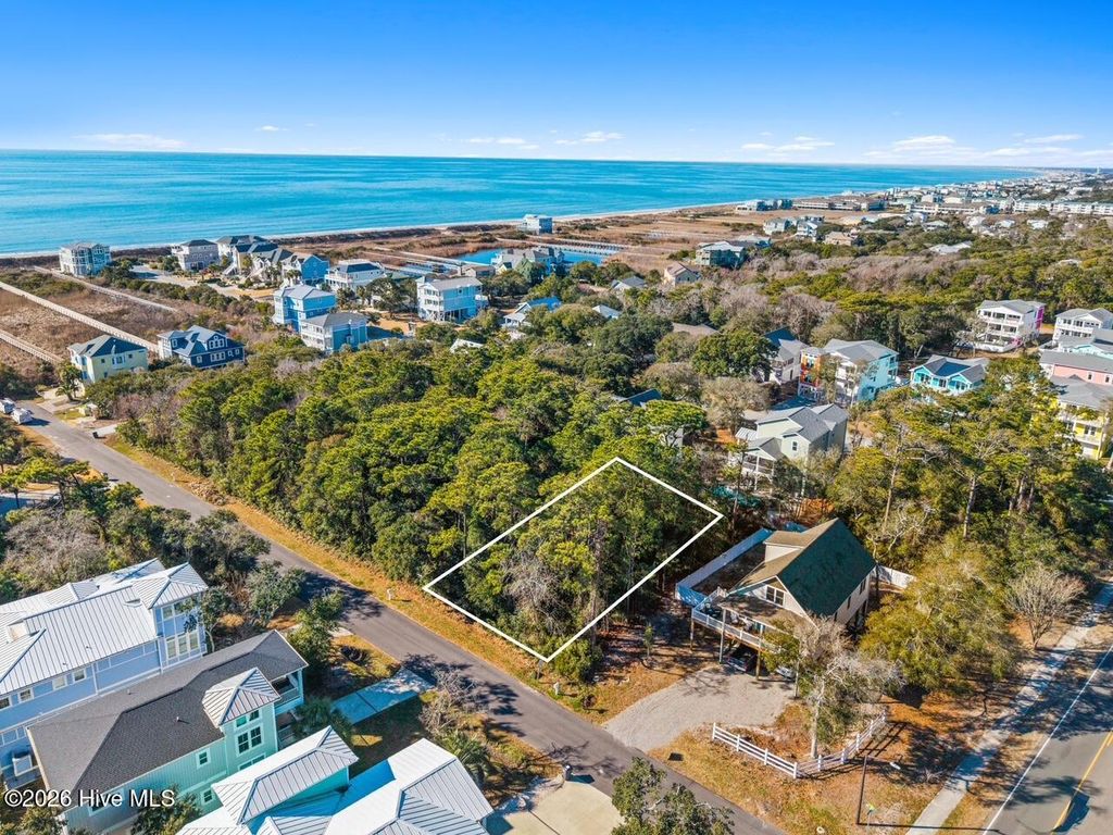 Photo of 14 SE 68th Street, Oak Island, NC 28465 (MLS # 100549758)