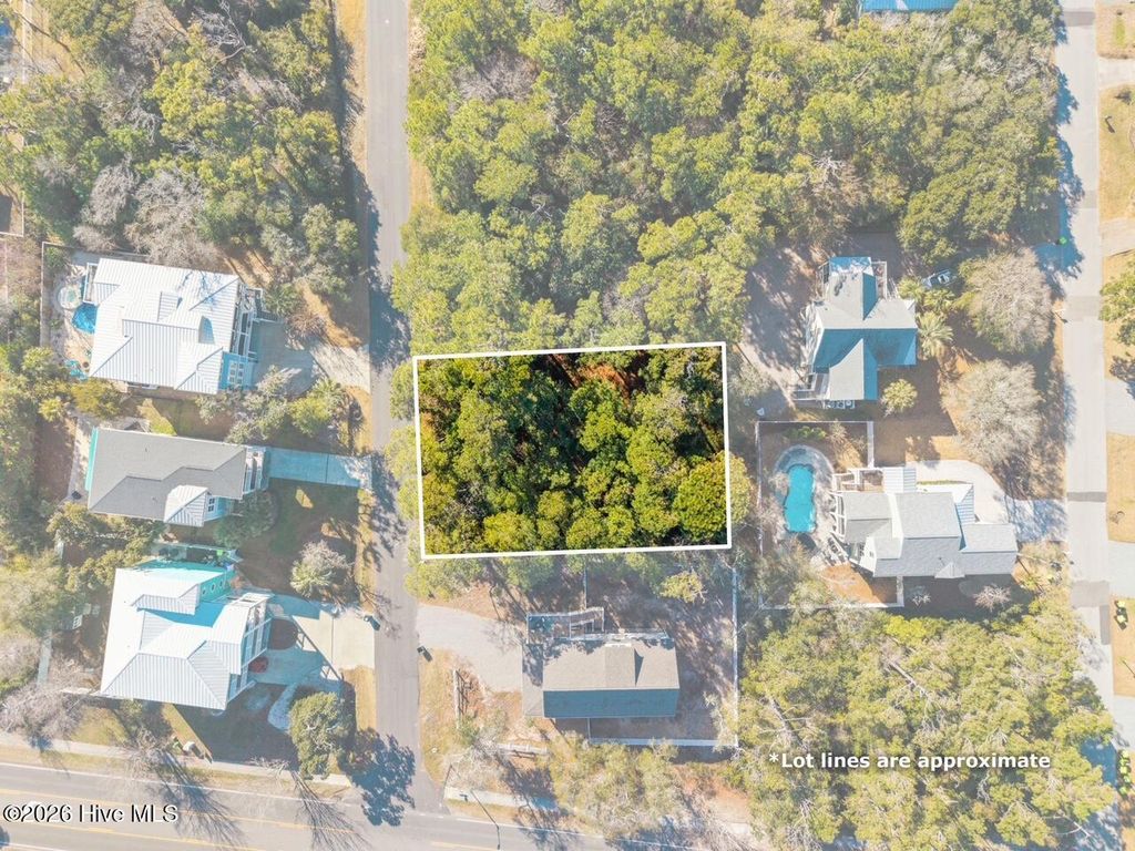 Photo of 14 SE 68th Street, Oak Island, NC 28465 (MLS # 100549758)
