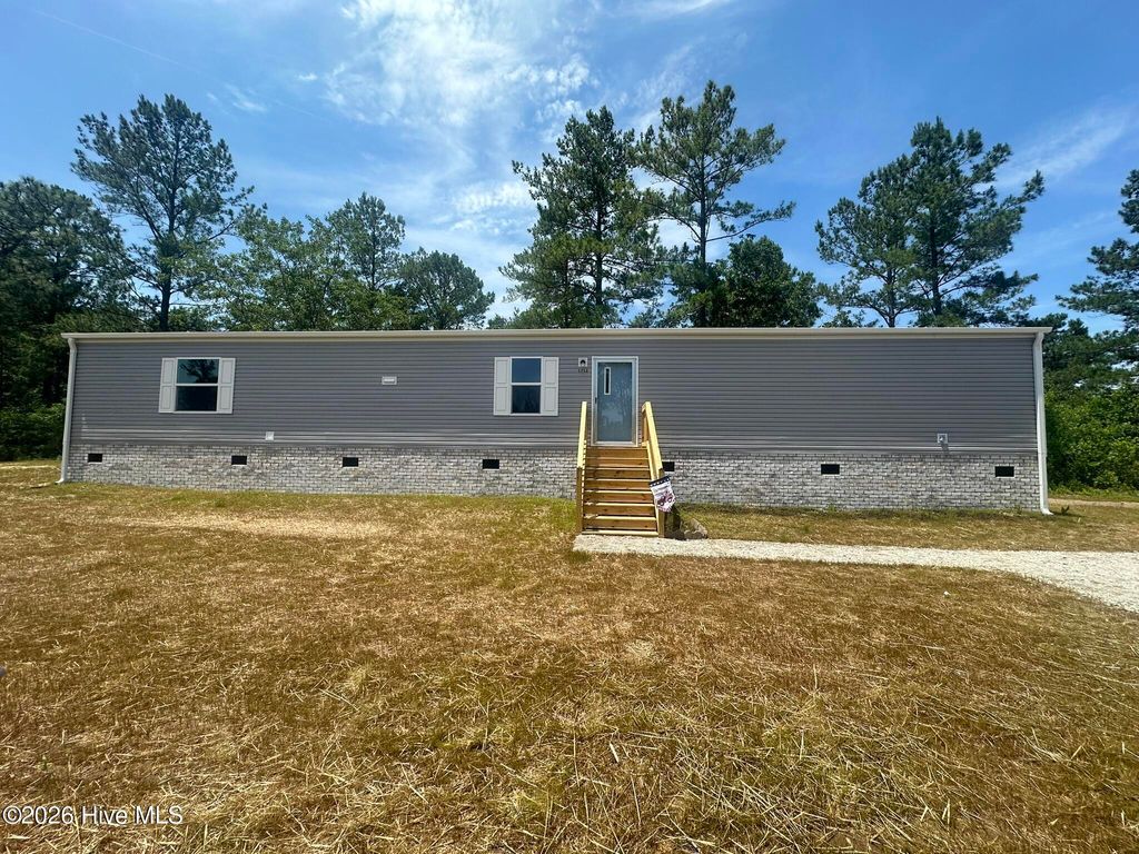 Photo of 1713 Colon Mintz Road NE, Leland, NC 28451 (MLS # 100578039)