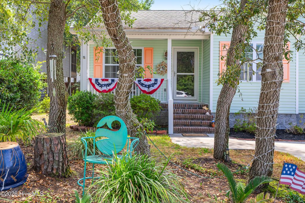 Photo of 145 NW 10th Street, Oak Island, NC 28465 (MLS # 100587776)