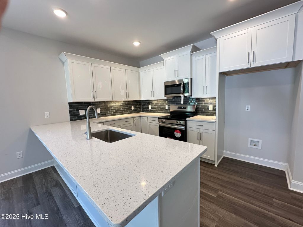 Photo of 3077 Oak Drive SW, Shallotte, NC 28470 (MLS # 100461932)