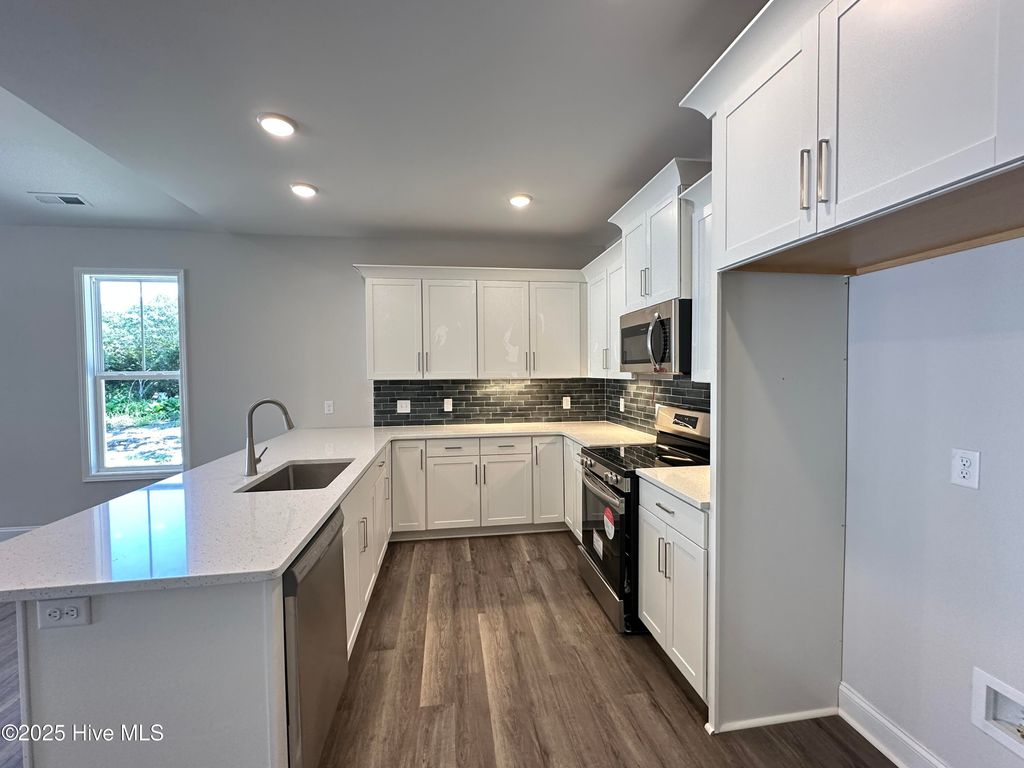 Photo of 3077 Oak Drive SW, Shallotte, NC 28470 (MLS # 100461932)