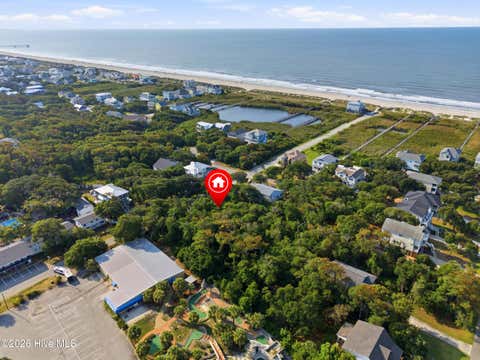 Tiny photo for 107 SE 64th Street, Oak Island, NC 28465 (MLS # 100593037)