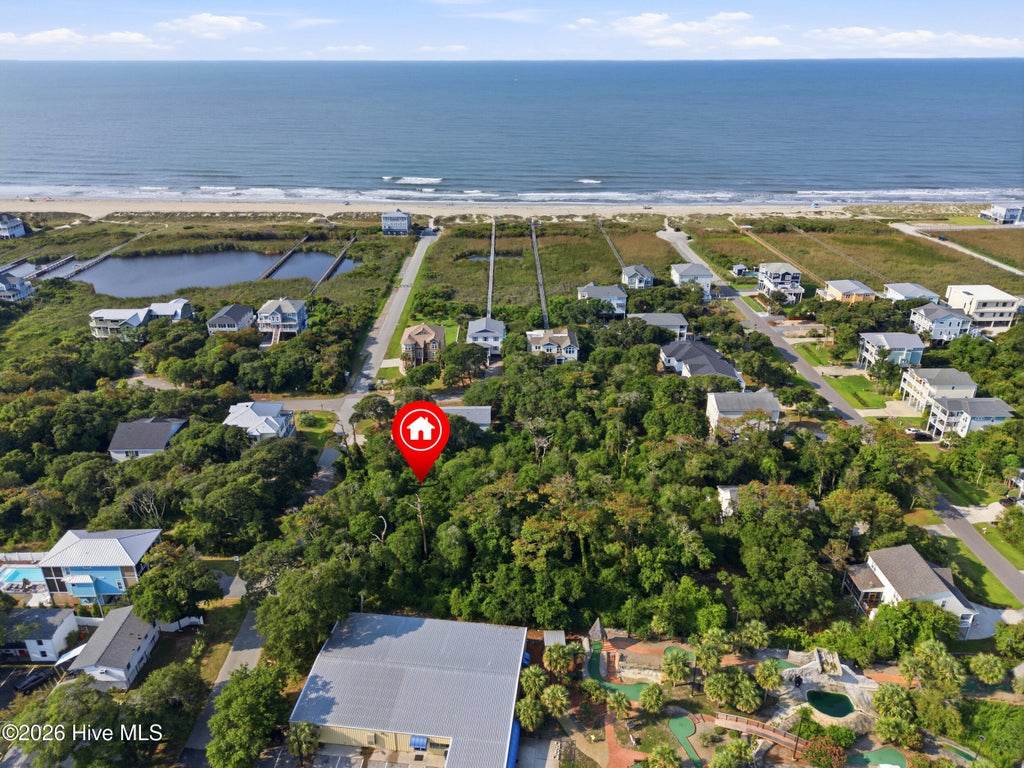 Photo of 107 SE 64th Street, Oak Island, NC 28465 (MLS # 100593037)