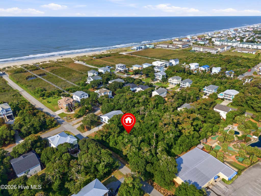 Photo of 107 SE 64th Street, Oak Island, NC 28465 (MLS # 100593037)
