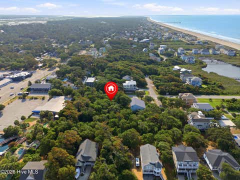 Tiny photo for 107 SE 64th Street, Oak Island, NC 28465 (MLS # 100593037)