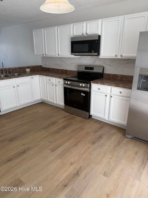 Photo of 7009 Banister Loop, Jacksonville, NC 28546 (MLS # 100603777)